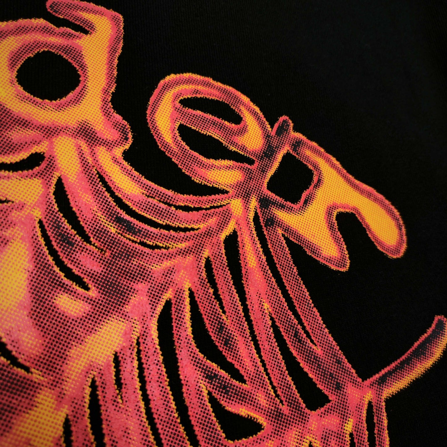 Full front artwork on Sp5der OG Web V2 Hoodie Black with multicolor puff logo and spider web
Close-up of raised multicolor SP5DER puff-print lettering on the black OG Web V2 Hoodie
Close-up of pink orange and yellow OG Web V2 graphic on Sp5der Hoodie Black