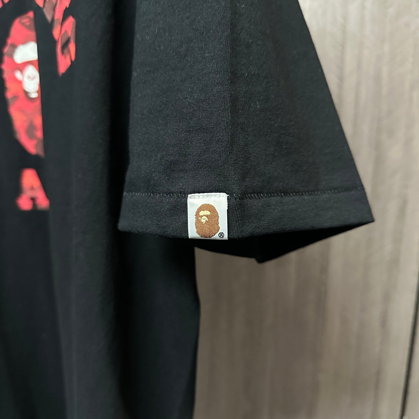 Streetwear T-shirt sleeve label and stitching detail