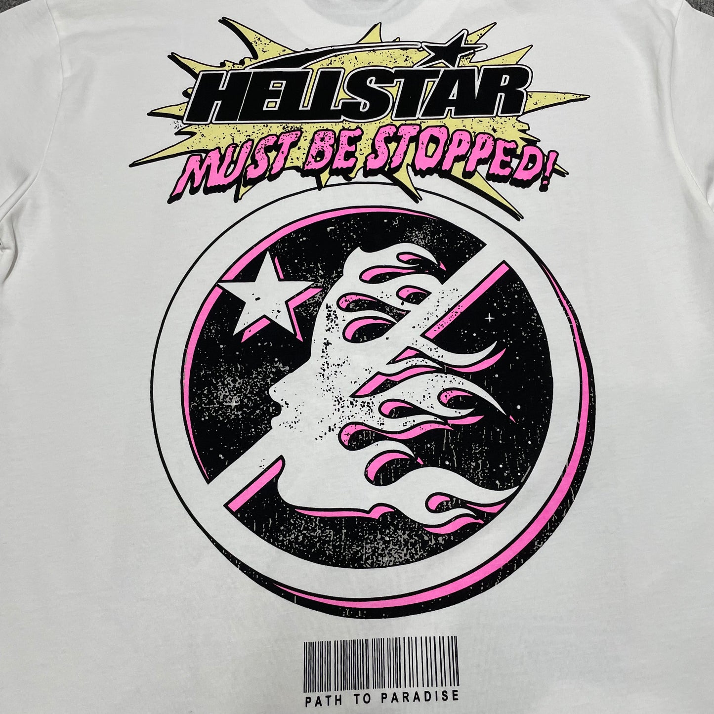 Full Breaking News comic graphic on the front of the white Hellstar T-Shirt
Close-up of the Brainwash by Hellstar newspaper-style graphic print
Close-up of the blue and purple brainwashed face artwork on the Hellstar Breaking News T-Shirt
Detailed view of the layered multicolor print texture on the Hellstar Breaking News graphic T-shirt
Breaking News headline and Brainwash by Hellstar lettering detail on the white graphic T-shirt
I cannot take my eyes off of it comic text graphic detail on the Hellstar T-Sh