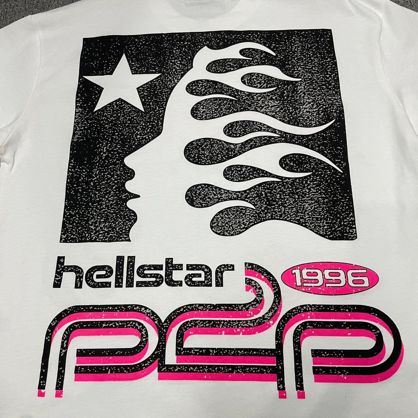 Full rear Hellstar graphic printed on the White and Pink Sport Logo T-Shirt
Close-up of the back graphic artwork on the Hellstar Sport Logo T-Shirt
Detailed view of the rear graphic print texture on the white Hellstar T-shirt