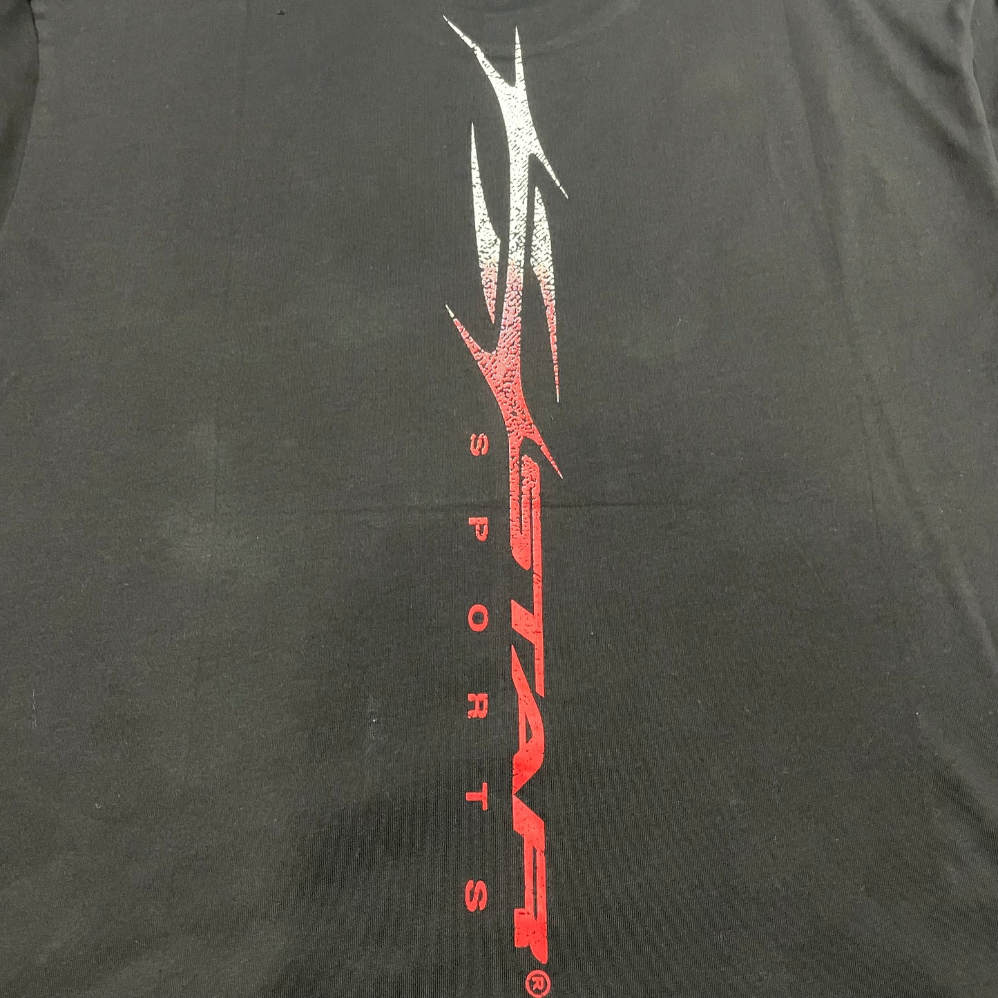 Full rear graphic artwork on the black Hellstar Red Gradient Sports Logo T-Shirt
Close-up of the back graphic print on the Hellstar Sports Logo T-Shirt
Hellstar logo detail printed on the back of the black graphic T-shirt
Detailed view of the rear print texture on the black Hellstar T-Shirt