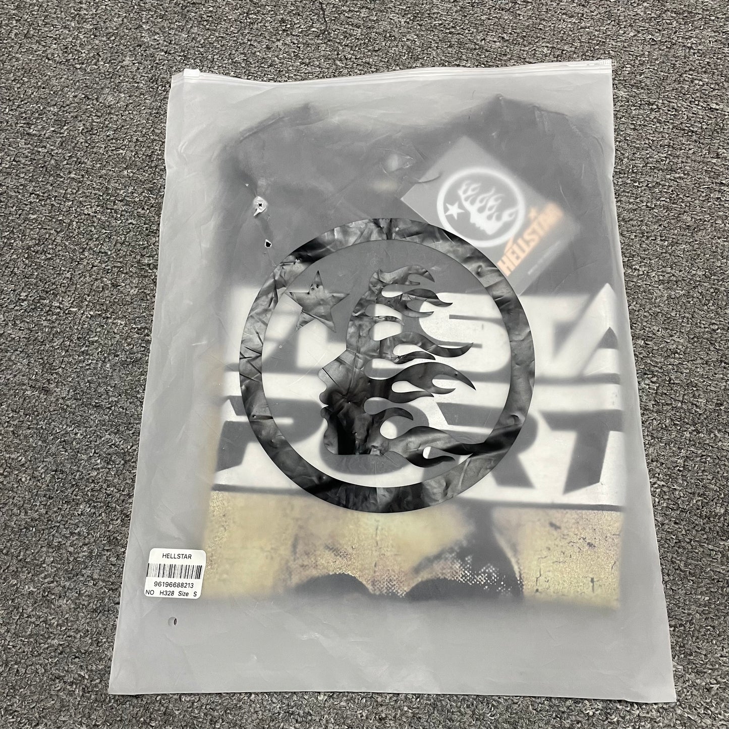Hellstar Sports mouth graphic washed black T-shirt inside branded zip packaging
Hellstar Sports mouth graphic distressed black T-shirt product video preview