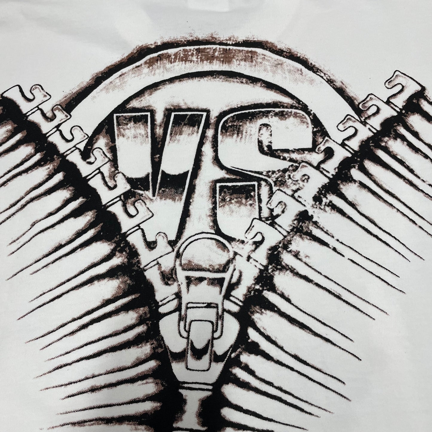 Vale Forever Scissorhands Tee oversized zipper and VS back artwork
Vale Forever Scissorhands Tee distressed zipper back print detail
Vale Forever Scissorhands Tee bold Vale Dreams lettering close-up
Vale Forever Scissorhands Tee distressed VS circular logo detail
Vale Forever Scissorhands Tee oversized VS back lettering detail
Vale Forever Scissorhands Tee zipper pull back graphic close-up
Vale Forever Scissorhands Tee distressed zipper teeth print detail