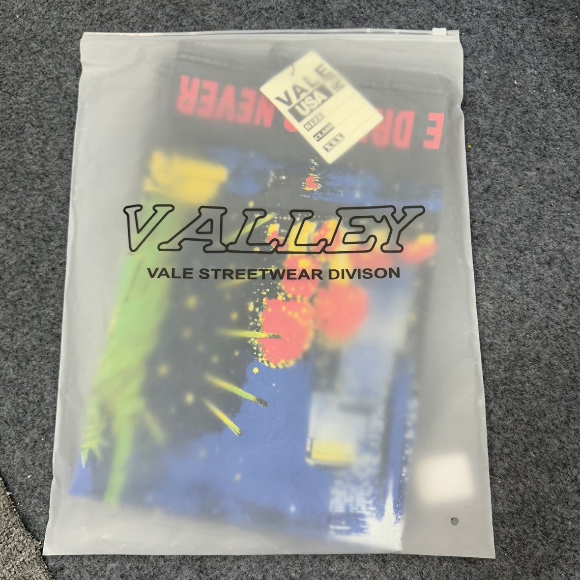 Vale Forever Skyline Bling Tee Black retail zip bag packaging