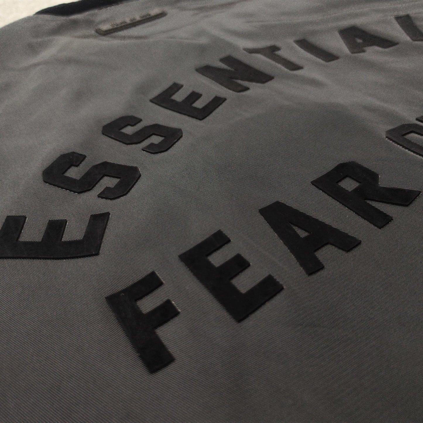 Fear of God Essentials Coaches Jacket
