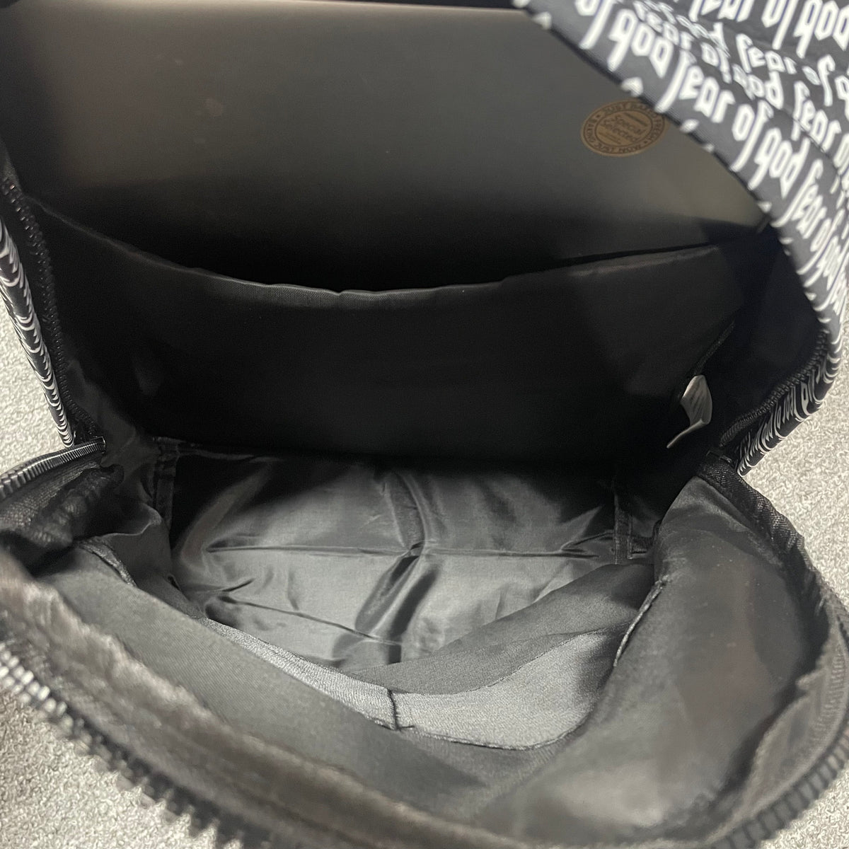 Fear of God (FOG) Essentials Allover Print Backpack