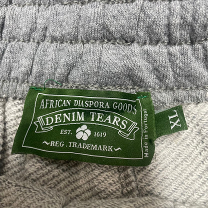 Denim Tears Cotton Wreath Sweatshorts Grey inner waistband label
Grey Cotton Wreath Sweatshorts care label and fabric information