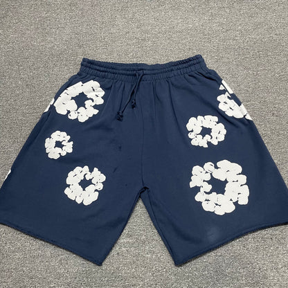 Denim Tears Cotton Wreath Sweatshorts Navy front view