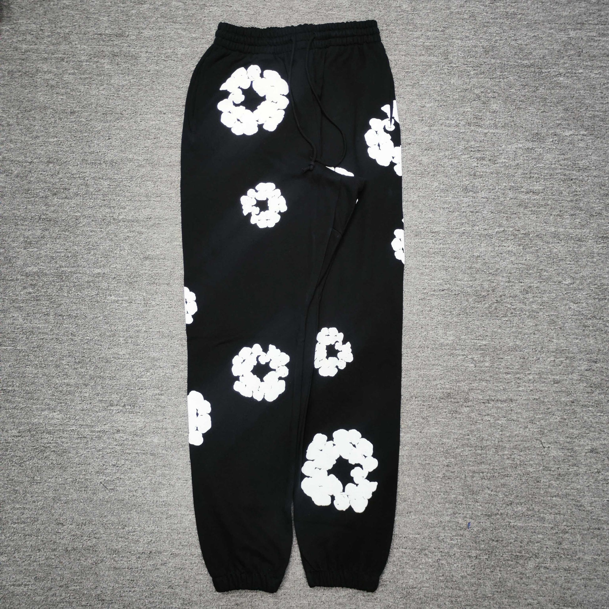 Denim Tears Cotton Wreath Sweatpants Black front view