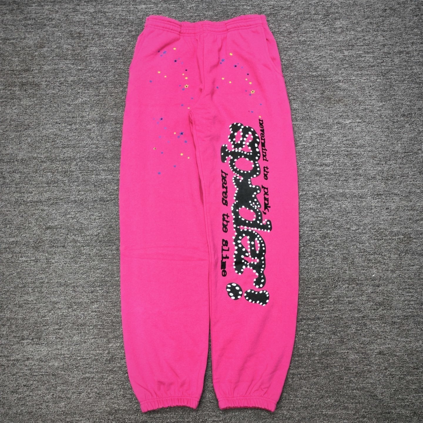 Sp5der P*NK sweatpants pink back view with elastic waistband and cuffed hems