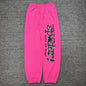 Sp5der P*NK sweatpants pink back view with elastic waistband and cuffed hems