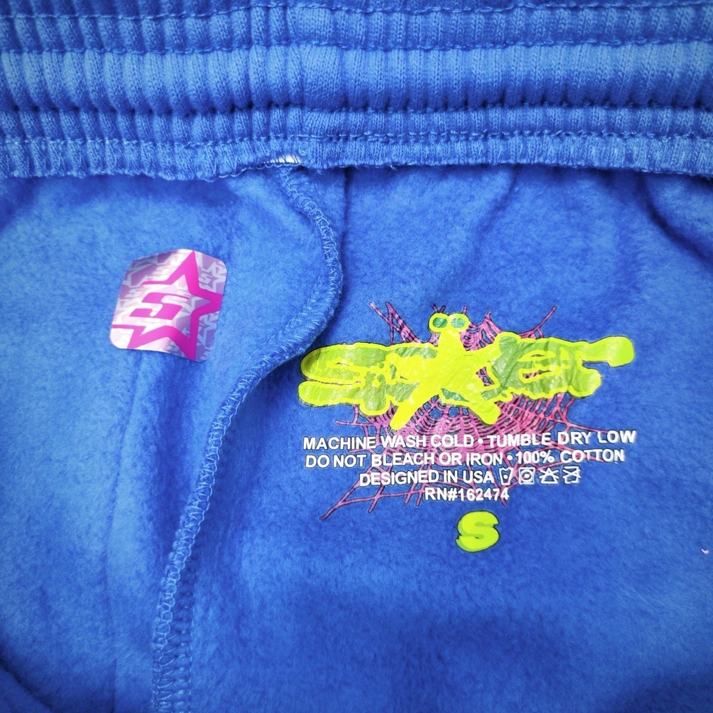 SP5DER TC Blue sweatpants inner waistband label detail
SP5DER TC Blue sweatpants size label detail