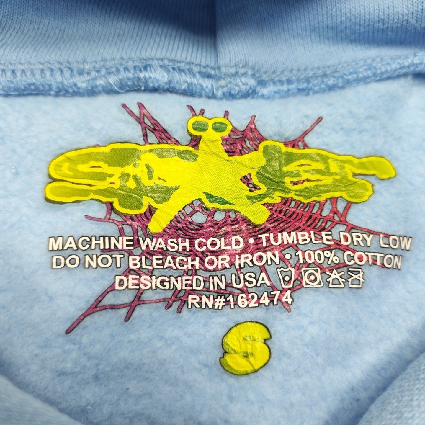 Sp5der Web Hoodie Sky Blue neck label and size tag detail