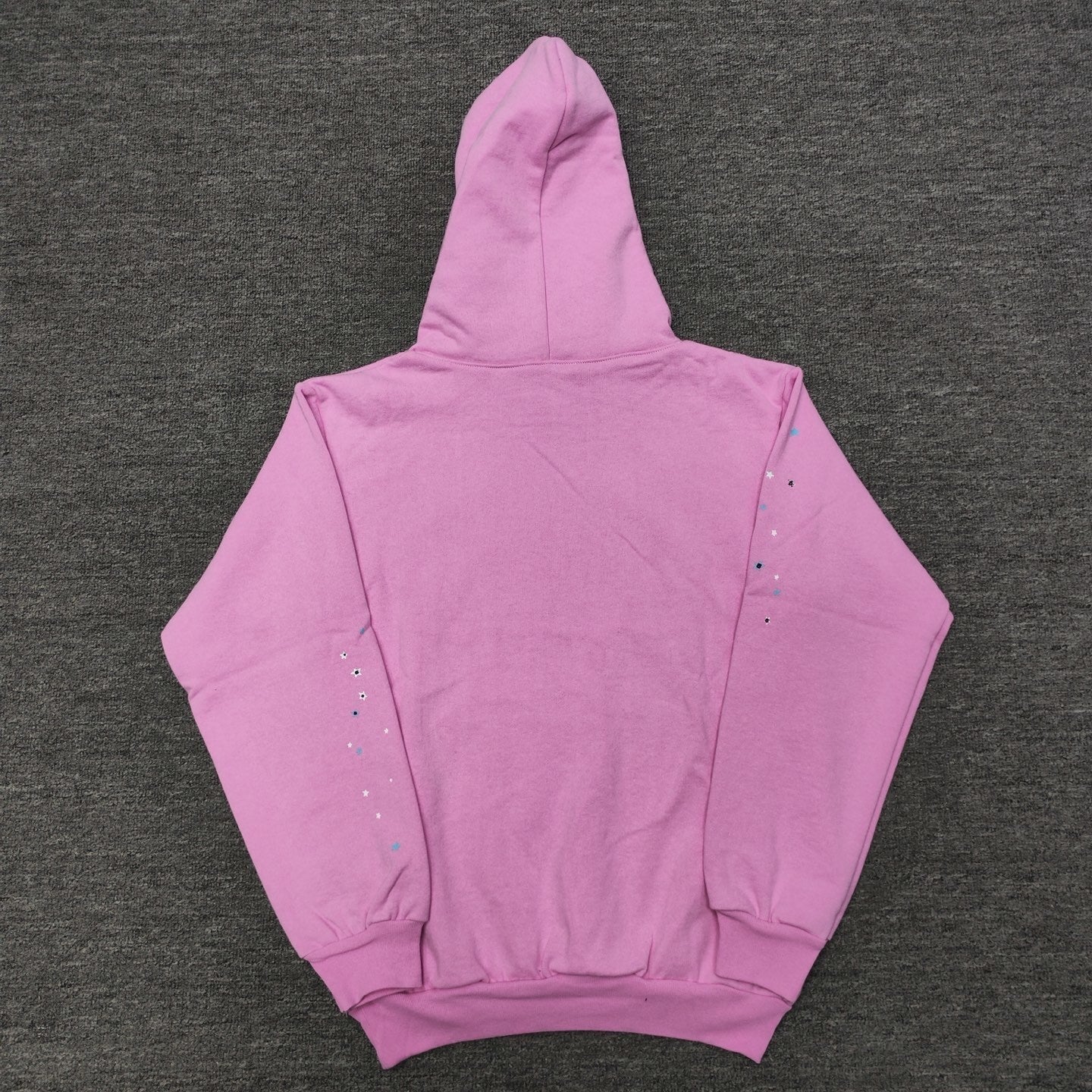 Sp5der OG Web Hoodie Pink back view showing the hood, ribbed hem and relaxed pullover shape