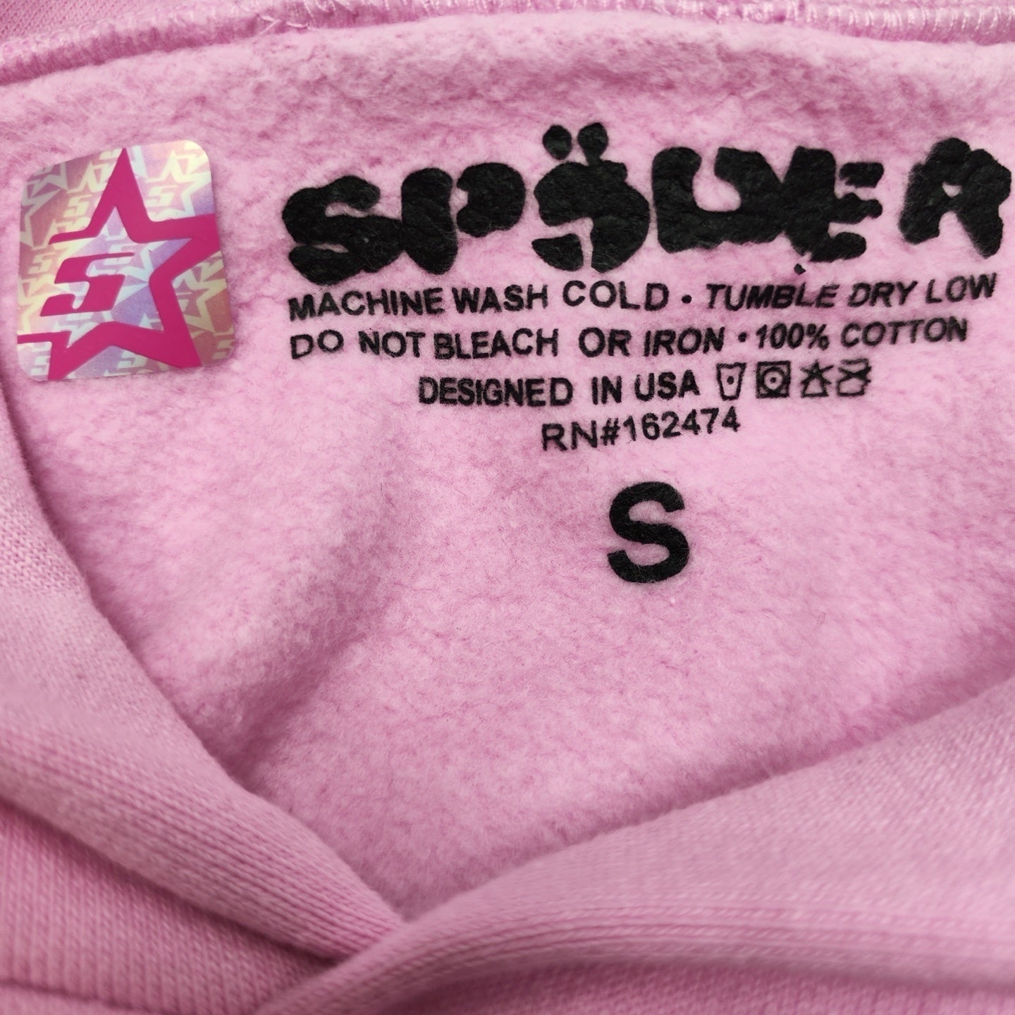 Sp5der OG Web Hoodie Pink neck label and size tag detail