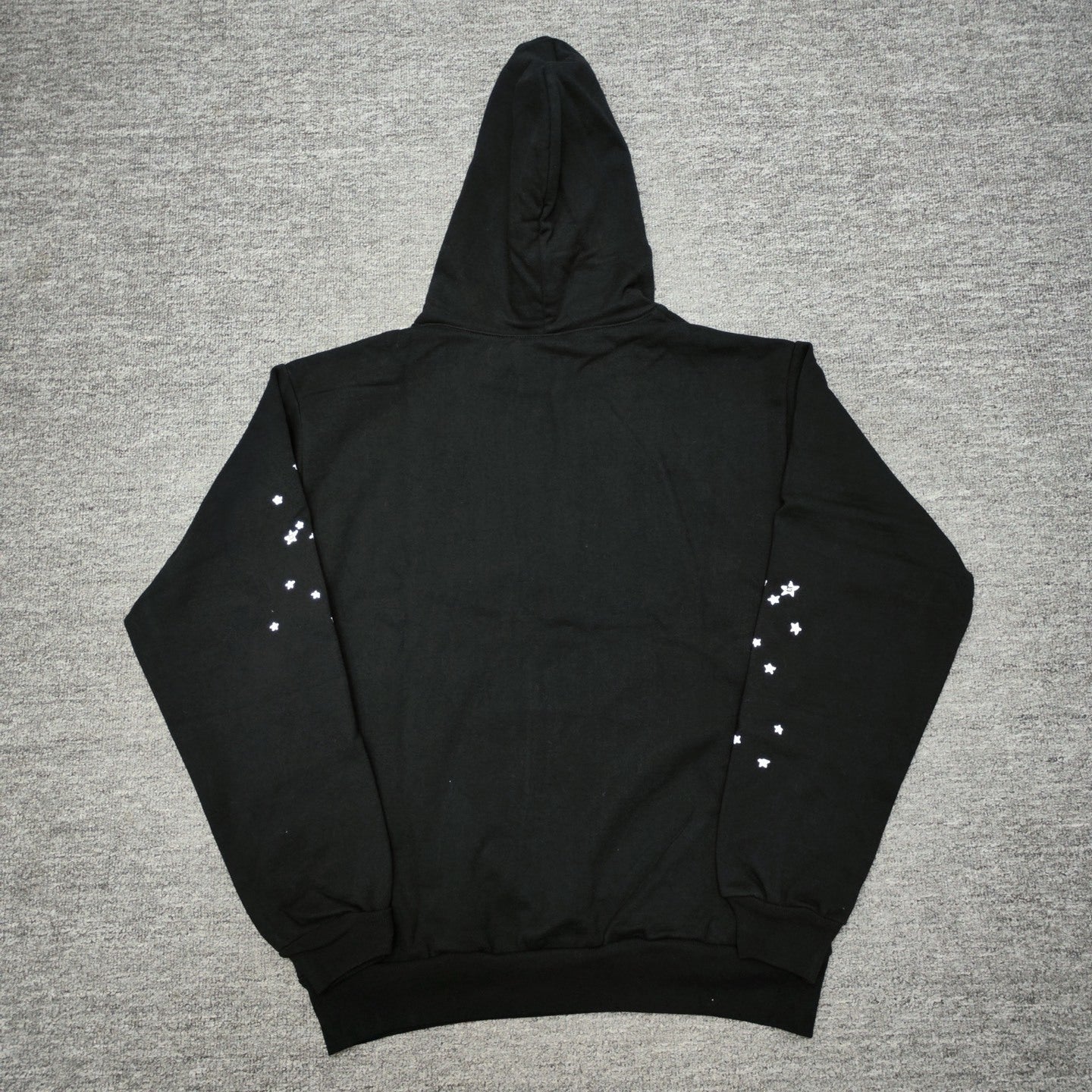 Sp5der OG Web Hoodie Black back view showing the hood, rear construction and ribbed hem