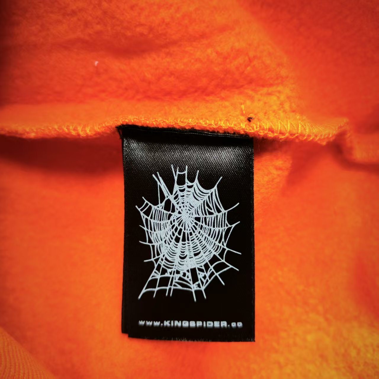 Sp5der Logo Hoodie Sweatshirt Orange neck label and size tag detail
Sp5der Logo Hoodie Sweatshirt Orange care label and washing instruction detail