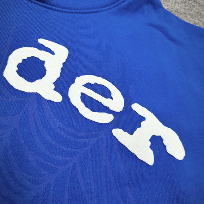 Full front artwork on Sp5der Logo Hoodie Blue with raised white logo and tonal web graphic
Close-up of raised white Sp5der lettering on the Blue Logo Hoodie
Side angle showing the three-dimensional raised white logo detail on Sp5der Blue Hoodie
Close-up of tonal spider-web artwork across the front of Sp5der Logo Hoodie Blue