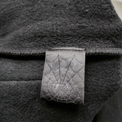 Sp5der Beluga Hoodie Onyx Yellow neck label and size tag detail
Sp5der Beluga Hoodie Onyx Yellow care label and washing instruction detail