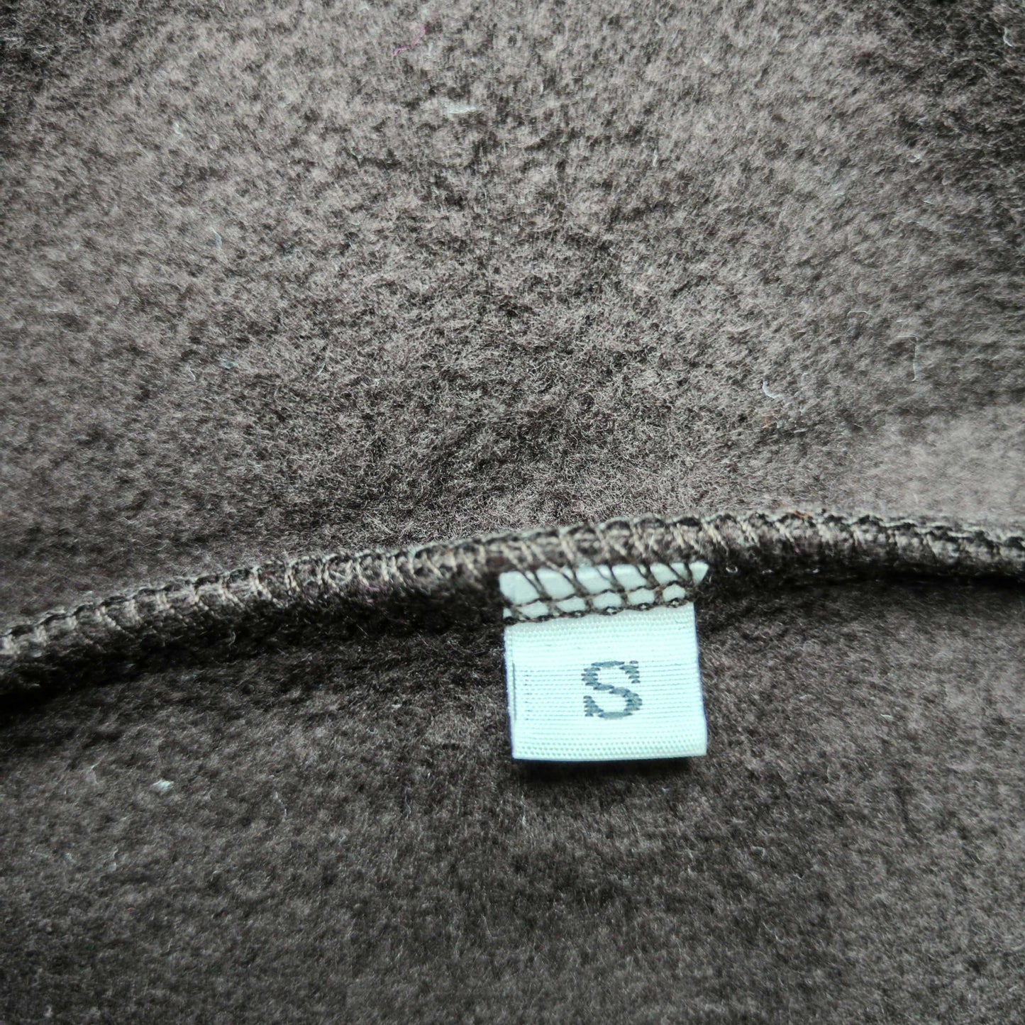 Travis Scott x Sp5der Days Before Rodeo Hoodie Brown neck label and size tag detail
Travis Scott x Sp5der Days Before Rodeo Hoodie Brown care label and washing instruction detail