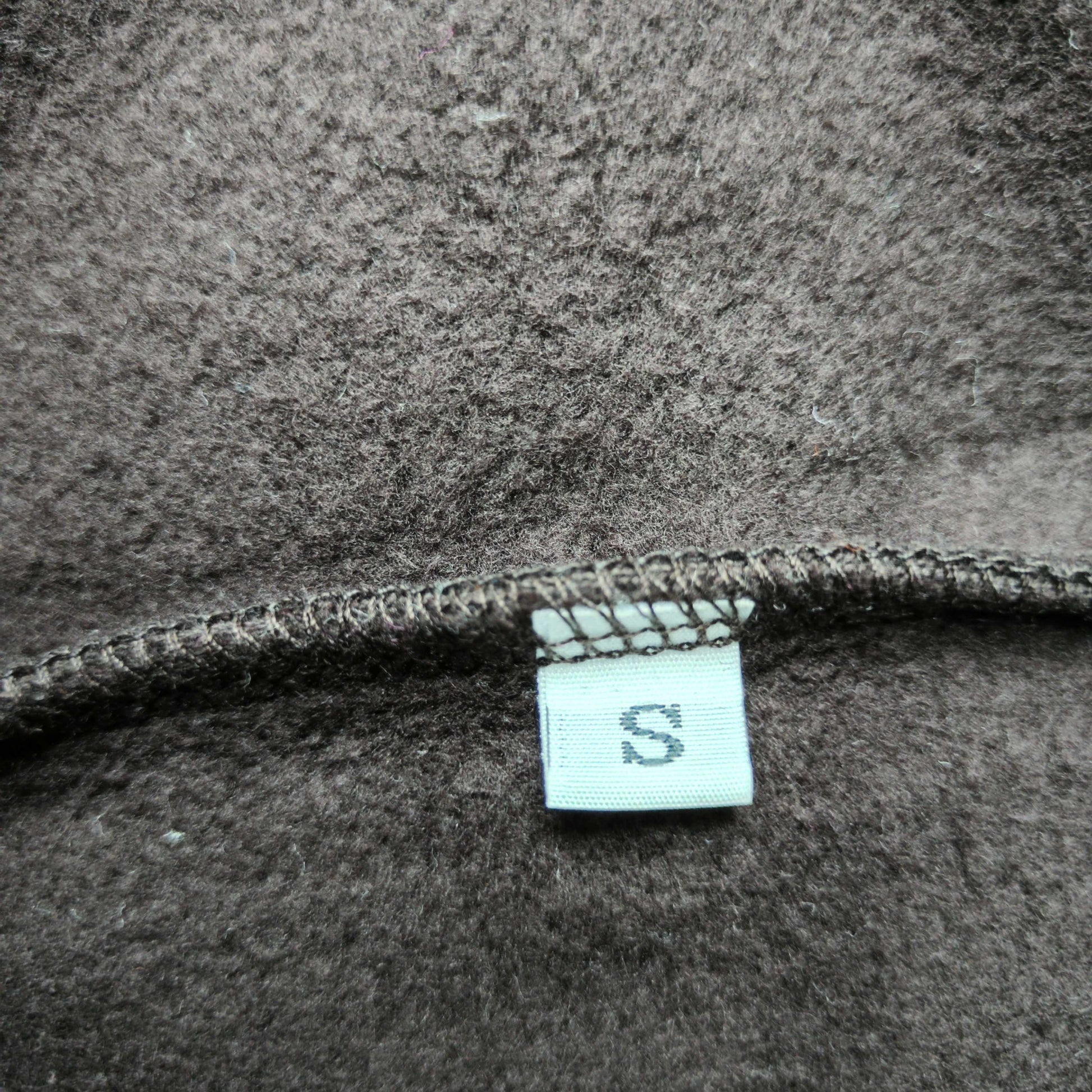 Travis Scott x Sp5der Days Before Rodeo Hoodie Brown neck label and size tag detail
Travis Scott x Sp5der Days Before Rodeo Hoodie Brown care label and washing instruction detail