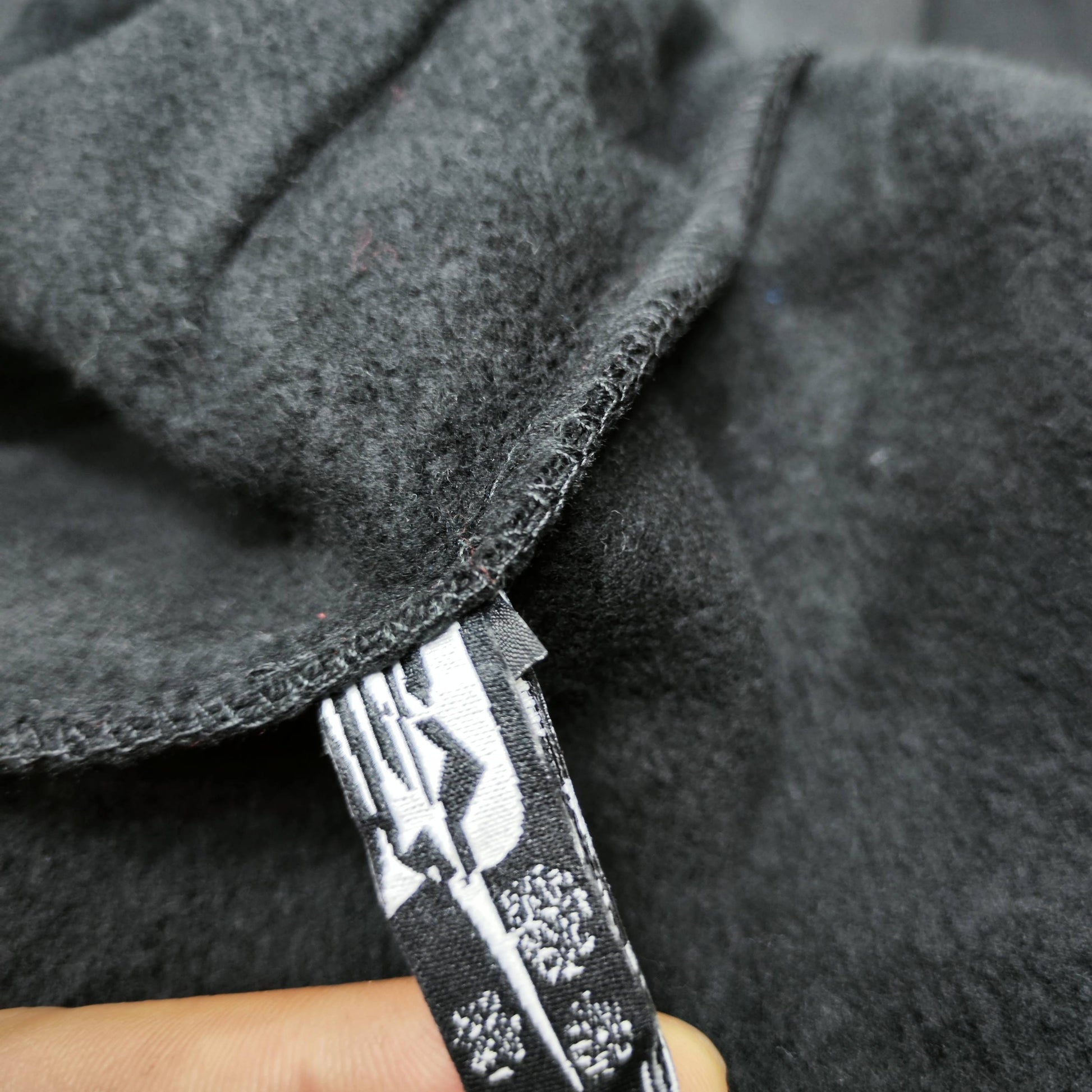 Sp5der Rhinestone OG Web V2 Hoodie Black neck label and size tag detail
Sp5der Rhinestone OG Web V2 Hoodie Black care label and washing instruction detail