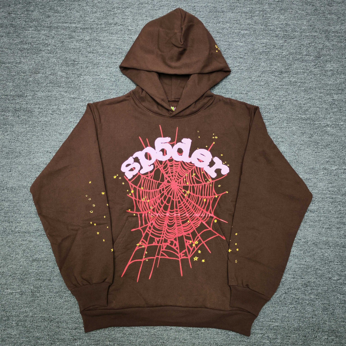 Sp5der Web Hoodie Brown front view with raised pink logo, red spider web and yellow stars