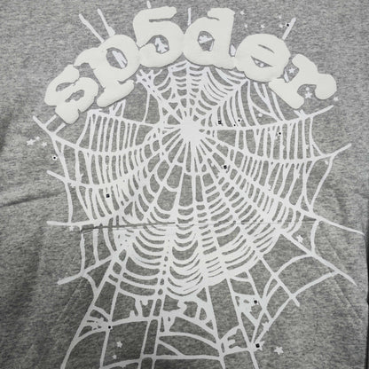 Full front artwork on Sp5der OG Web Hoodie Heather Grey with white puff logo and spider web
Full front artwork on Sp5der OG Web Hoodie Heather Grey with white puff logo and spider web
Side angle showing the three-dimensional white puff-print texture on Sp5der OG Web Hoodie
Close-up of white spider-web artwork on the front of Sp5der OG Web Hoodie Heather Grey
