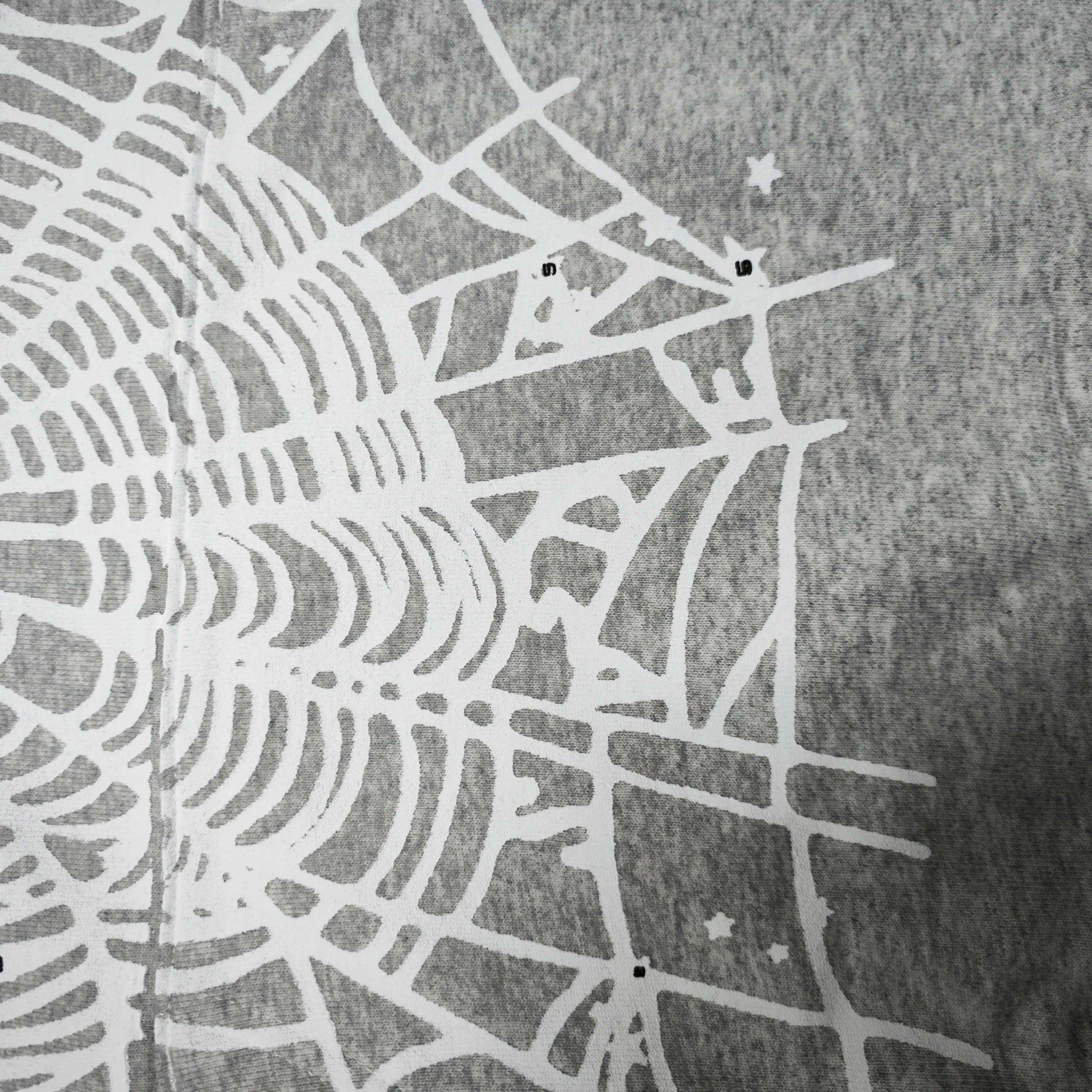 Full front artwork on Sp5der OG Web Hoodie Heather Grey with white puff logo and spider web
Full front artwork on Sp5der OG Web Hoodie Heather Grey with white puff logo and spider web
Side angle showing the three-dimensional white puff-print texture on Sp5der OG Web Hoodie
Close-up of white spider-web artwork on the front of Sp5der OG Web Hoodie Heather Grey