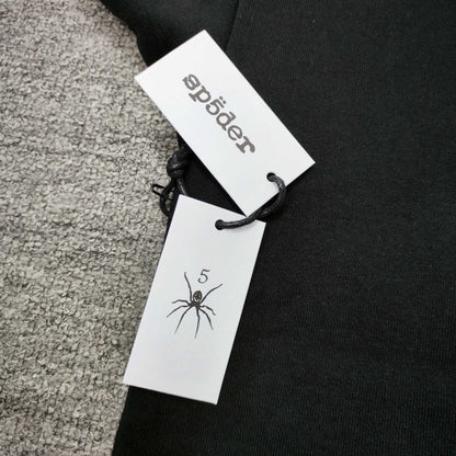 Sp5der Angel Number Hoodie Black neck label and size tag detail
Sp5der Angel Number Hoodie Black care label and washing instruction detail