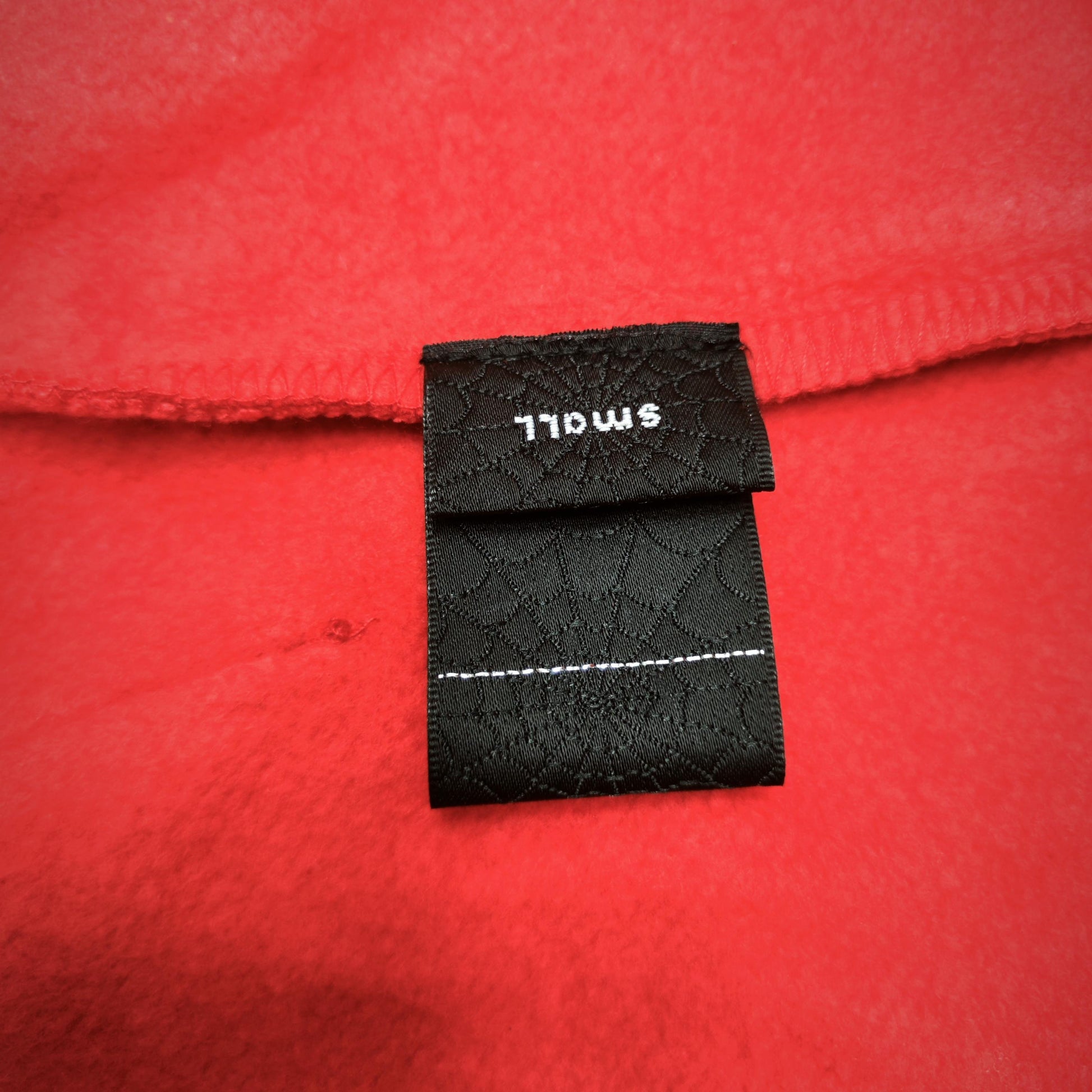 Sp5der P*NK V2 Hoodie Red neck label and size tag detail
Sp5der P*NK V2 Hoodie Red care label and washing instruction detail