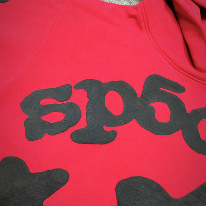 Full black puff-print artwork on Sp5der Beluga Hoodie Red Black with logo, stars and number graphics
Full black puff-print artwork on Sp5der Beluga Hoodie Red Black with logo, stars and number graphics
Full black puff-print artwork on Sp5der Beluga Hoodie Red Black with logo, stars and number graphics
Black star and number graphics printed across the sleeve of Sp5der Beluga Hoodie Red Black
