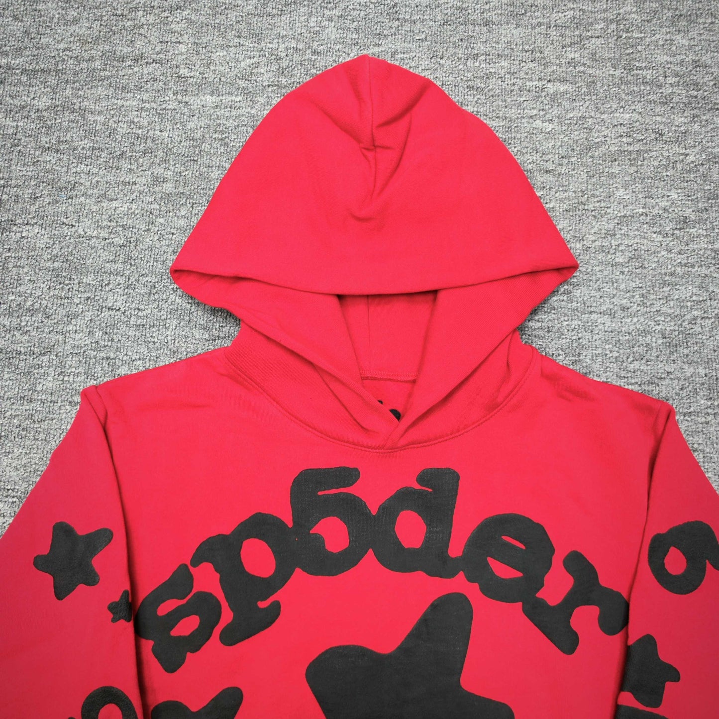 Full black puff-print artwork on Sp5der Beluga Hoodie Red Black with logo, stars and number graphics
Full black puff-print artwork on Sp5der Beluga Hoodie Red Black with logo, stars and number graphics
Full black puff-print artwork on Sp5der Beluga Hoodie Red Black with logo, stars and number graphics
Black star and number graphics printed across the sleeve of Sp5der Beluga Hoodie Red Black