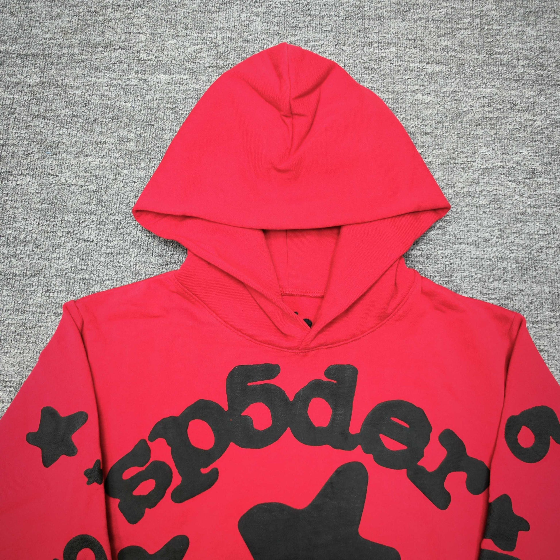 Full black puff-print artwork on Sp5der Beluga Hoodie Red Black with logo, stars and number graphics
Full black puff-print artwork on Sp5der Beluga Hoodie Red Black with logo, stars and number graphics
Full black puff-print artwork on Sp5der Beluga Hoodie Red Black with logo, stars and number graphics
Black star and number graphics printed across the sleeve of Sp5der Beluga Hoodie Red Black