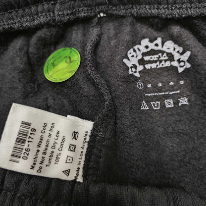 SP5DER Souvenir black sweatpants size label detail
SP5DER Souvenir black sweatpants care label front view