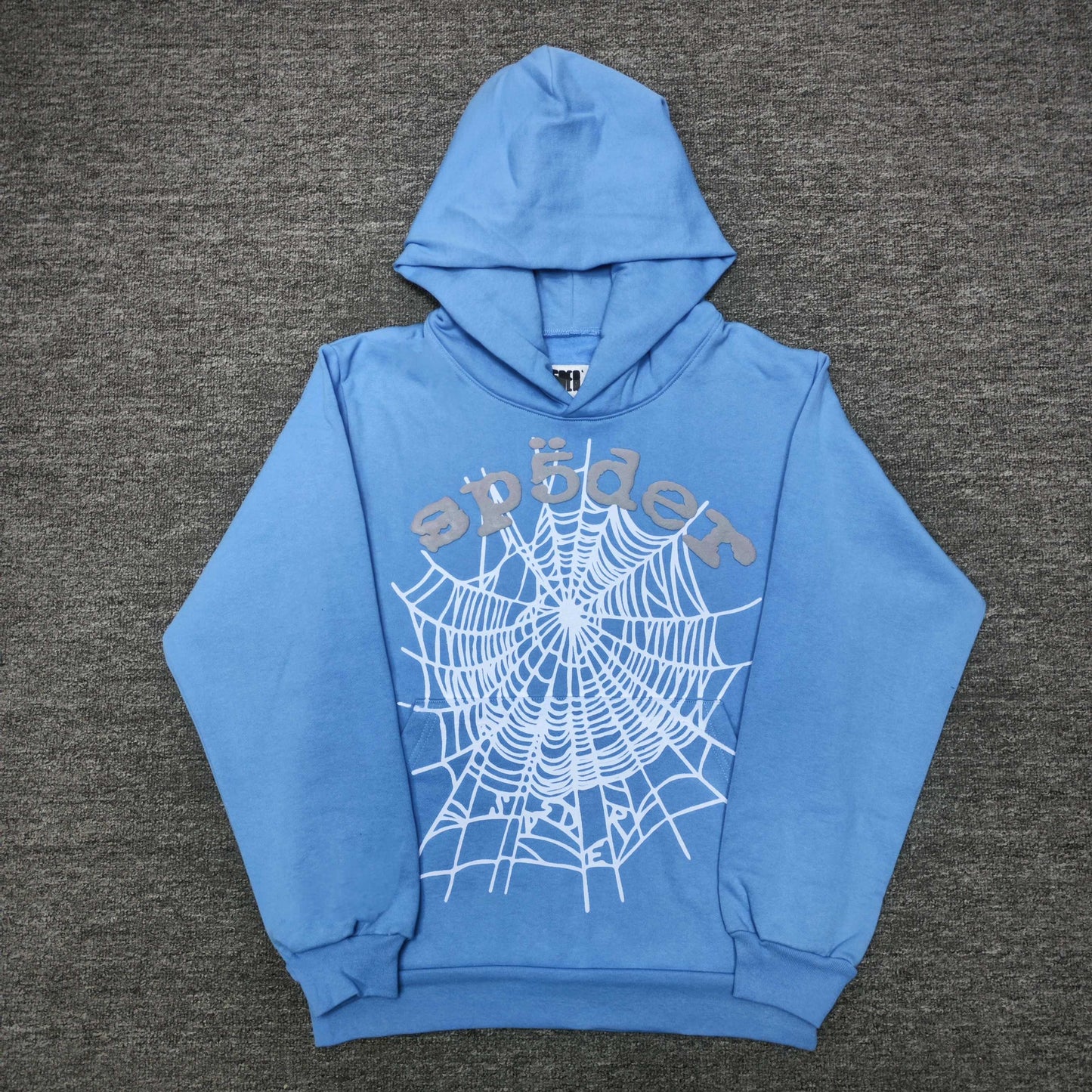 Sp5der OG Web V2 Hoodie Dusty Blue front view with raised grey logo and white spider web