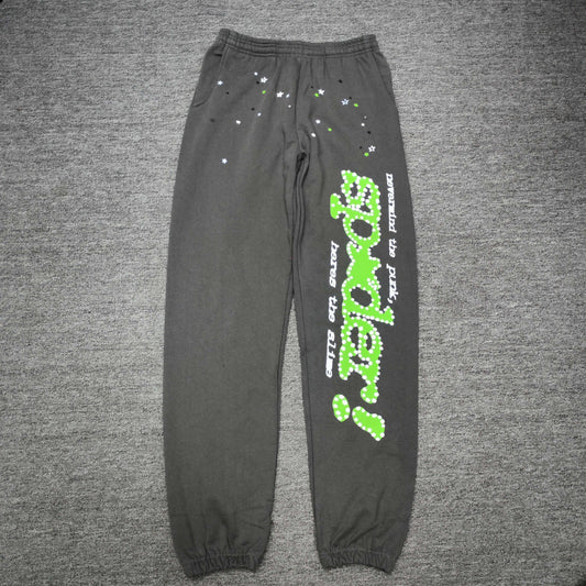 SP5DER Punk V2 slate grey sweatpants front view with green leg graphic and scattered stars
