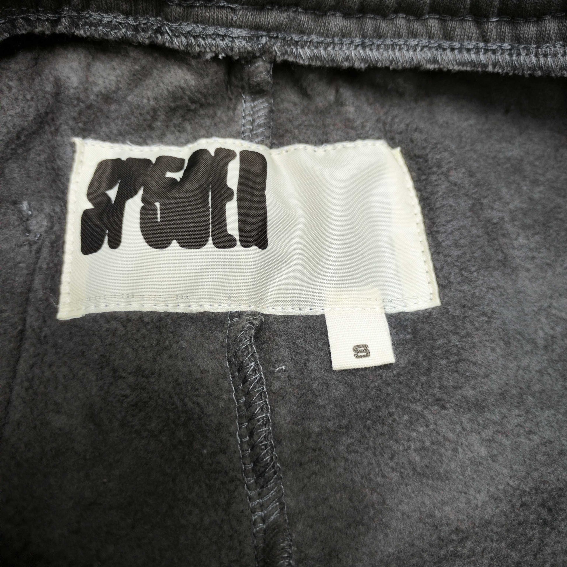 SP5DER Punk V2 slate grey sweatpants inner waistband label detail