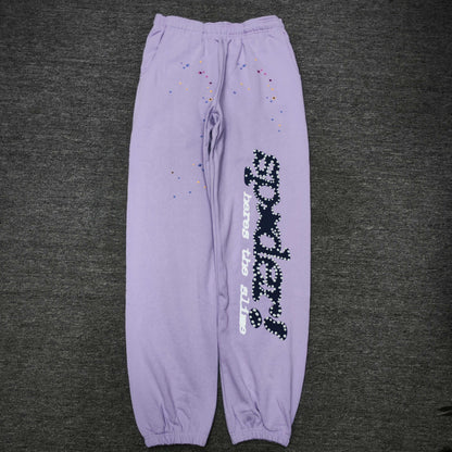 SP5DER Acai purple sweatpants front view with navy leg graphic and multicolor stars