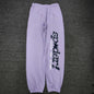 SP5DER Acai purple sweatpants front view with navy leg graphic and multicolor stars
