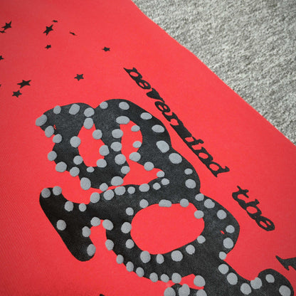 Close-up of black SP5DER puff-print graphic on red P*NK V2 sweatpants
Raised black puff-print texture on SP5DER P*NK V2 red sweatpants
Close-up of defined puff-print edges on SP5DER P*NK V2 sweatpants