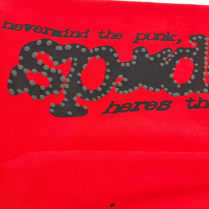 Close-up of black SP5DER puff-print graphic on red P*NK V2 sweatpants
Raised black puff-print texture on SP5DER P*NK V2 red sweatpants
Close-up of defined puff-print edges on SP5DER P*NK V2 sweatpants