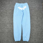 SP5DER Classic sky blue sweatpants front view with raised white logo