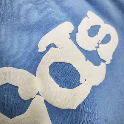 Close-up of white SP5DER puff-print logo on sky blue Classic sweatpants
Raised white puff-print texture on SP5DER Classic sky blue sweatpants
Close-up of clean puff-print edges on SP5DER Classic sweatpants
Close-up of clean puff-print edges on SP5DER Classic sweatpants