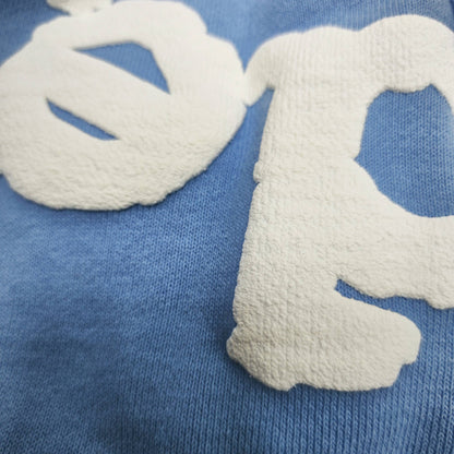 Close-up of white SP5DER puff-print logo on sky blue Classic sweatpants
Raised white puff-print texture on SP5DER Classic sky blue sweatpants
Close-up of clean puff-print edges on SP5DER Classic sweatpants
Close-up of clean puff-print edges on SP5DER Classic sweatpants