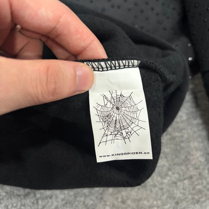 Sp5der VVS Hoodie neck label and size tag detail
Sp5der VVS Hoodie care label and washing instruction detail