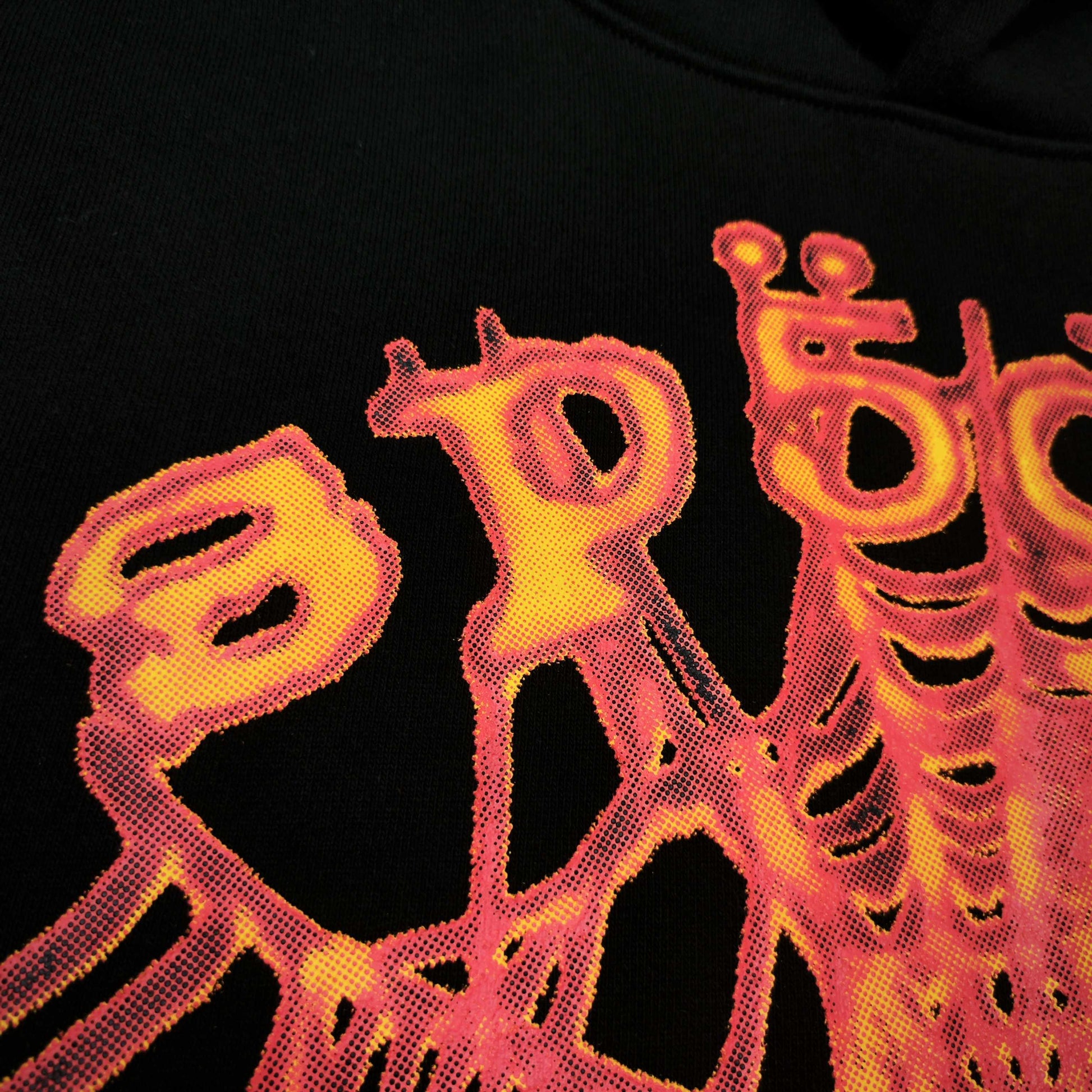 Full front artwork on Sp5der OG Web V2 Hoodie Black with multicolor puff logo and spider web
Close-up of raised multicolor SP5DER puff-print lettering on the black OG Web V2 Hoodie
Close-up of pink orange and yellow OG Web V2 graphic on Sp5der Hoodie Black