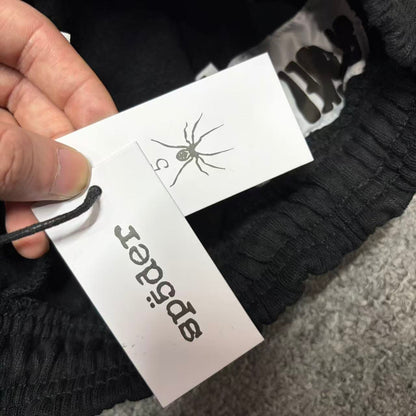 SP5DER Issue 404 black sweatpants inner waistband label detail