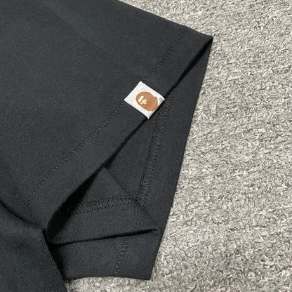 BAPE College graphic T-shirt sleeve label and stitching detail