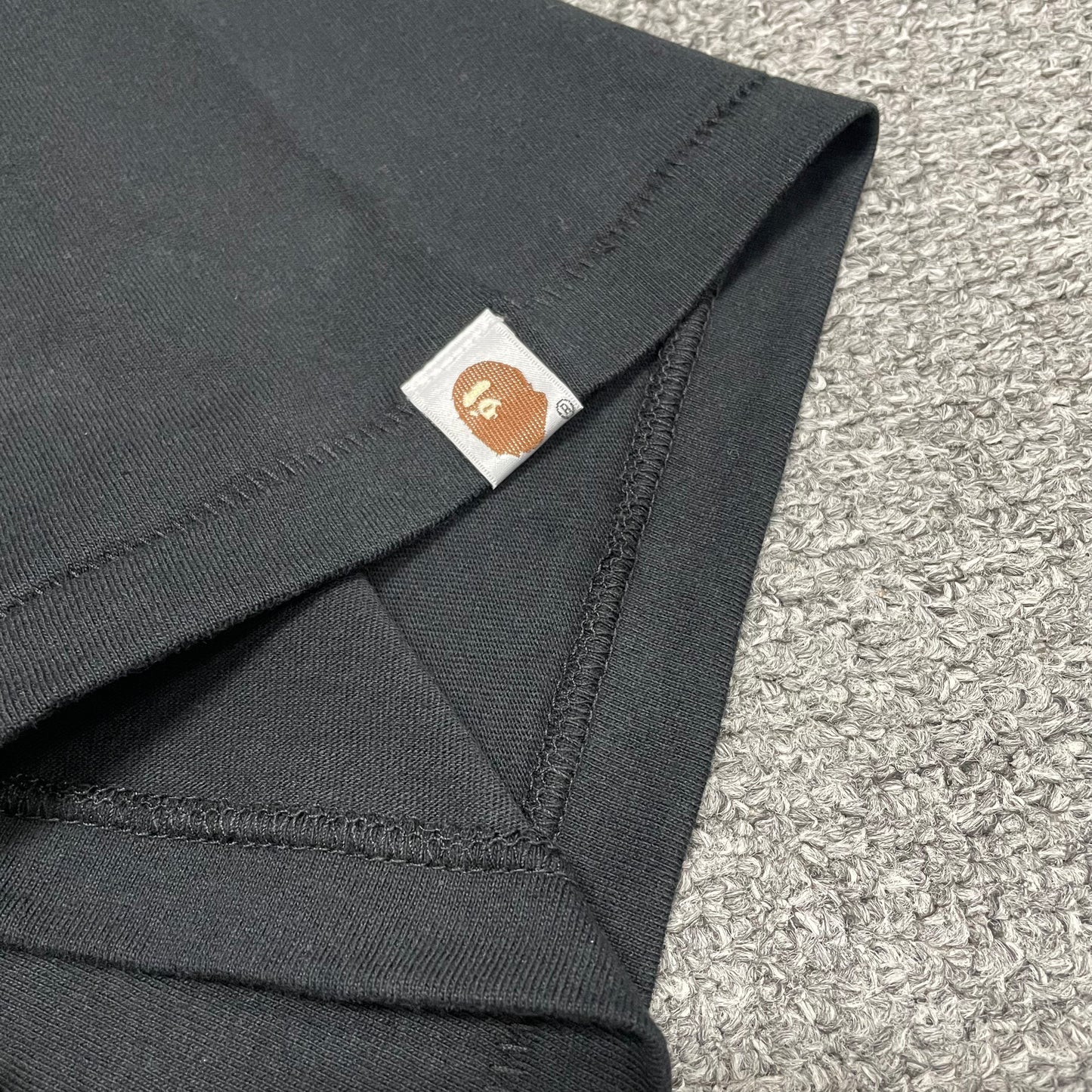 BAPE Graphic T-shirt sleeve label and stitching detail